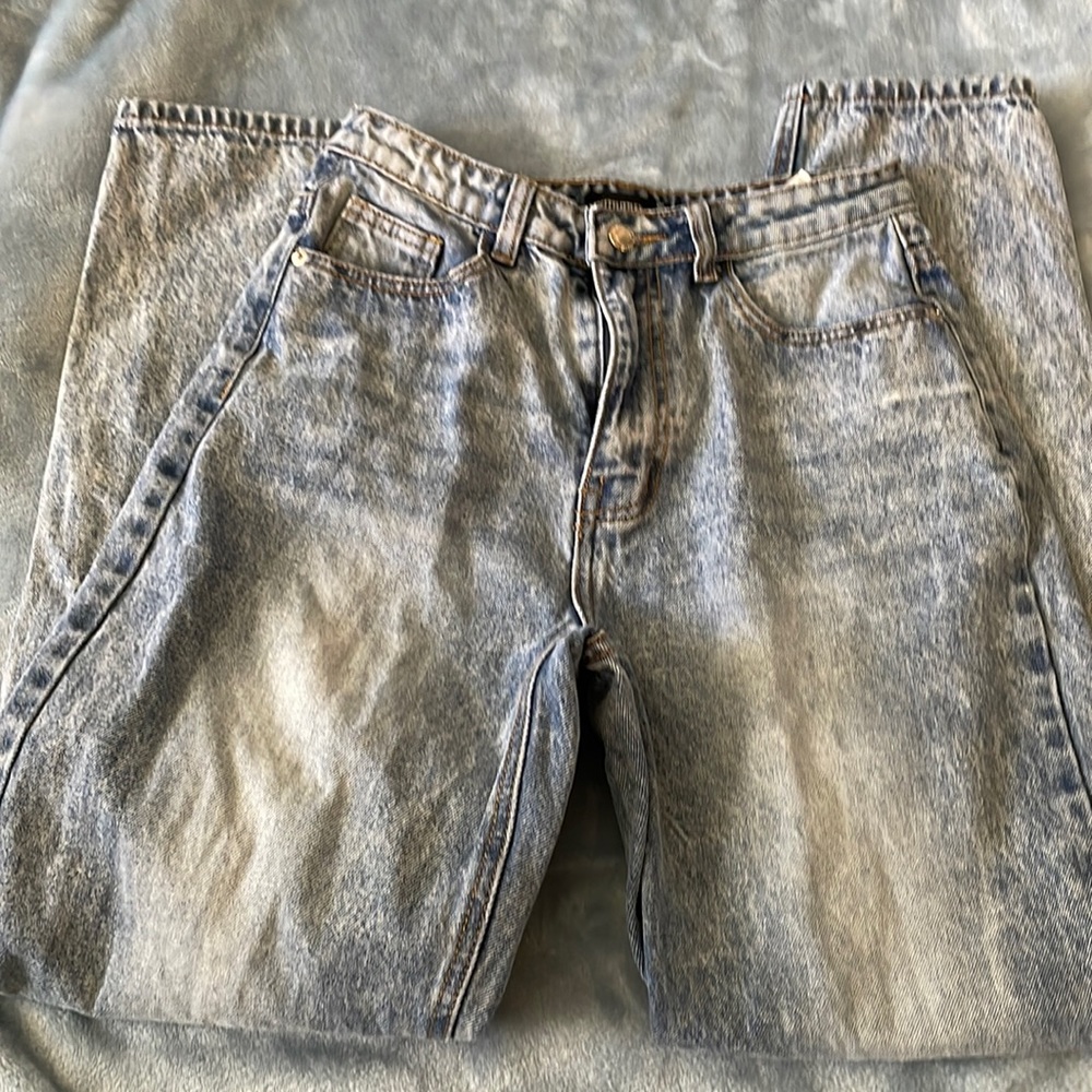 Acid wash jeans.